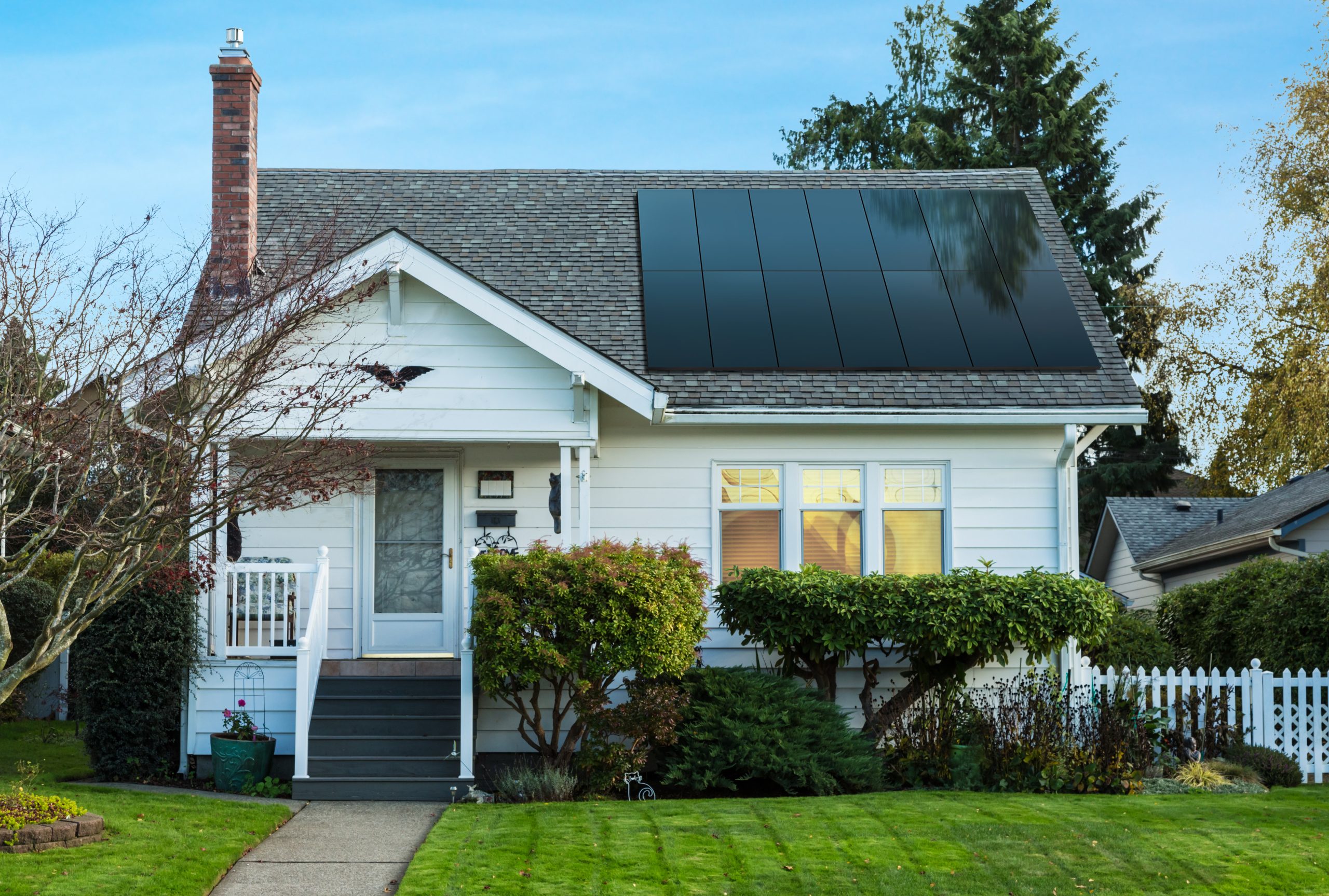 A photo of a house after a completed residential solar panel installation project by Sun Up Zero Down