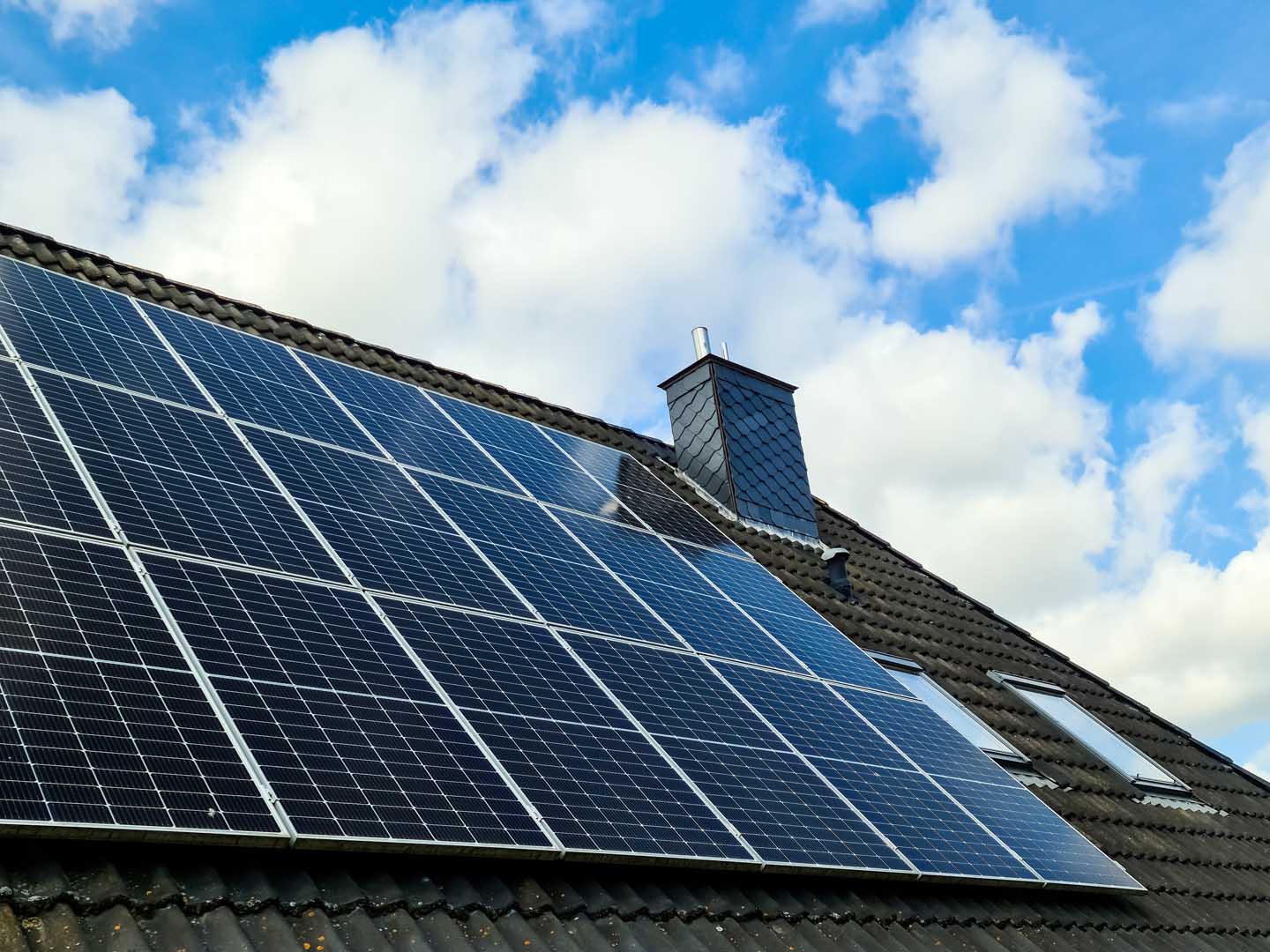 Photovoltaic,Panels,Are,Producing,Renewable,Energy,On,A,Residential,Rooftop
